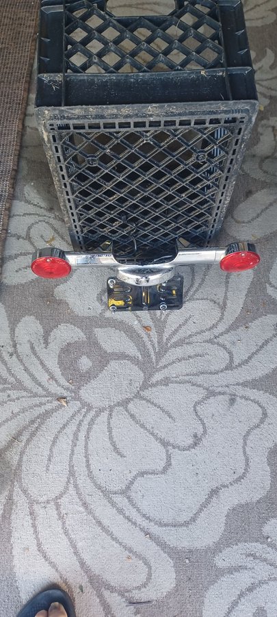 Rear turn signal bar. wires to license plate light are cut. $20