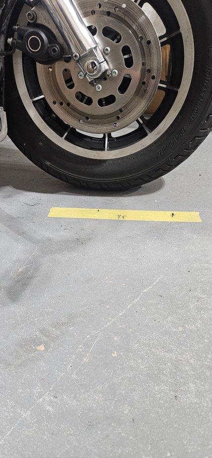 No, it doesn't quite look like it. The mark in the front is where the center line of the forks ended up