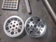 Wheelie bar wheels for a drag car