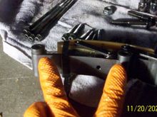 There are two spacers on the back of the tensioner.