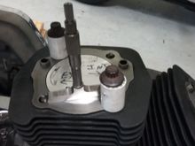 Found TDC, then using a depth gauge to see how far under the deck the piston was