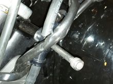 slide bolt through arms and mounting slot on bike (with help of random woman from the house)