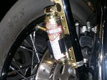 Presto extinguisher bracket made from sheet brass and band clamps