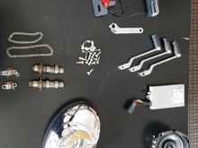 Stock 96ci cams and hydraulic tensioners - $50
Stock 2011 ultra fairing speakers- $25
shifter pegs- $10 ea
Highway pegs (2 sets) $70 
Air cleaner assembly - $30
Cb modual- $20