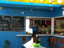 Tipsy Toucan Bar. Happy hour here daily!