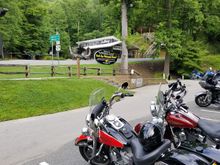 Not a great picture, but that is the set up. The Black and Red bike. The other is my wife's with stock bars and set up.