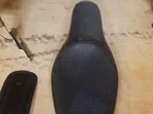 65 OBO has some tears underneath