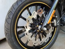 13 spoke mags from an early 2000's FXD. Chopper Hauss 14" 13 spoke rotor and break caliper relocation bracket  B