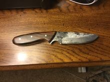 
The blade is made from Japanese steel.  Not true Damascus but a layer of high carbon steel, that is sandwiched between several layers of forge welded low carbon steel.  He said that gives it good workability, with a blade edge that stays sharp.