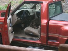 The old boy keeps a watchful eye on his truck!