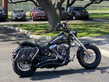 Rear tire is a 180/60- 17 and is 6.75" wide
Front is 150/80-17 and is 5.75" wide.
Both rims 4.5" wide