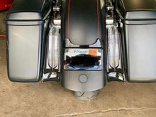 I opted not to cut my tribar and rather remove the whole unit and replace with filler lights. Also eliminated the bullet style lights with a custom dynamics license plate. 