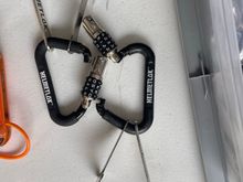 Helmet locks that attach to dring or latch. 