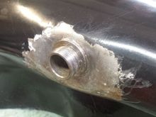 Made the mistake of buying a used 5 gallon tank. PO used JBWeld in an attempt to stop leak.