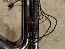 side bracket where the pipes are welded together