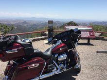 This is an iPhone pic of my bike at the top of Emory Pass in New Mexico.  I intentionally took the picture with the bike not centered to emphasize the background scenery.