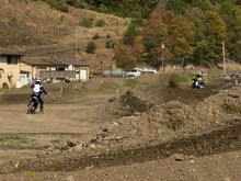 A Motorcycle Dirt track next to the Zimmerman Covered Bridge.  There are two tracks there and must have had races or time trials going on