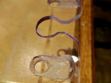 The routed sections make sure that the wires aren't squashed between the the windshield and inside of the fairing. I only put the holes there so there woudln't be anything where the wires make the bend where they come through the fairing.