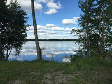 Sitting at the lake. Got the grill heating up. Don't know what is for supper yet. Daughter in law is cooking tonight so I know to keep quiet and wait. Was a beautiful day in the northland today.