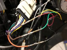 Violet/black is a common wire used by all three SQ-/PTT/SQ+ so I had to find the right combination of combining two wires on the violet/black. Yellow and red from the Homelink ended up being those two wires.