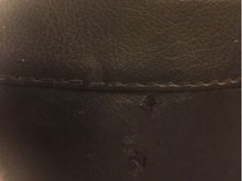 Rub marks/ small holes made by the back rest.