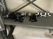 Removed exhaust and front fender. Showing my front wheel some love with the protective blanket my SO offered up for the cause. Removed coil/bracket/top engine motor mount and VR. 