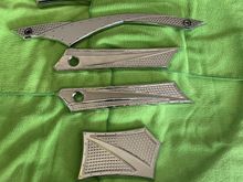 JC Choppers passenger pegs, brake pedal, shift linkage, and saddlebag hinge covers. Two shift pegs not pictured but are included in the sale (need to pick them up still)