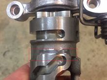 Shaved area (with dremel). Shift fork tracks in the "S" shaped groove and you are shaving just the back side upper lip. 