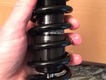 Light coating of oil on shocks is normal per my conversation with Howard.