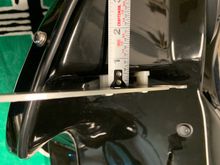 Measurement of spacers on left side of fairing.
