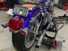 Put lights  and turn signal bar on but the day starting as I forgot to run the wires so take off the fender and run the wires thru the inside tubing in the fender !