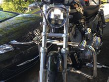 Wisamic LED light installed, chrome eyebrow cover removed.