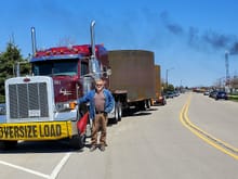 Yours Truly. Standing next to my home away from home. I was hauling 18' wide cement kiln sections to Alphina Michigan. I had to take them from Milwaukee Wisconsin to Mantiwoc Wisconsin. Get on the USS BADGER to take a 4 hr cruise across lake Lake Michigan to Ludington Michigan. 1,800$ .  I took 4 Trips across the lake. The USS BADGER Is the last coal powdered ferry ship on lake Michigan. Lots of motorcycle riders from all over the world. One trip i talked with a guy from Italy.