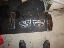 these got blacked out too, i traded the shiny pads to a dude for his factory rubber pads. no chrome! lol!