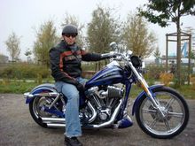 I replaced the rear shocks with 9.5" billet struts effectively lowering the bike 2" and slamming the rear wheel into the fender.  The pipes are being replaced to make right turns a little less noisy!  Next pict will show the new pipes when installed.  I love this bike!