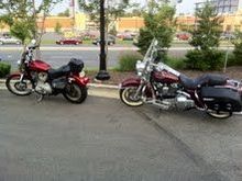 We are now a two harley family. The roadking looks good with the red mistress