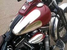 Right side. scallops!  Done in Jaguar Auto Burgandy with gold pinstripe.  Also, you can see the starter and horn buttons that I relocted to the dash.  No wiring in the bars.  The high/low beam in also on the fron left of the dash (toggle switch not visable from this view).