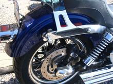 Busted light, damaged shock, Fender strut scratched, Luggage rack bent, Seat torn and sissiy bar and pad bent and scract up, exhaust tip scratched up also both pegs damaged, fender chiped