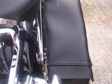 saddlebags mounted to modified fender strut bolts