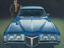 1969 Pontiac Grand Prix , i had one with stock 428 motor with 370 horsepower , i should have never sold it !