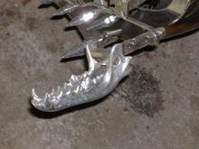 footpeg i cast from a jaw bone.