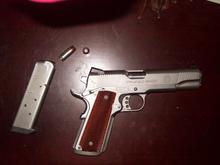 My Springfield 1911A1 TRP with Flying Ashtray (Speer Gold Dot) ammunition.