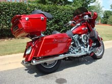 HOK candy apple red with PPG Vibrance tinted pearl top coat; painted SG mirrors; Hog Tunes tweeter pod; etc..