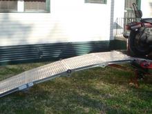DSC01760 SCORPION ramp,10 foot long 36 inches wide folds lengthwise 4 times, very solid but quite expensive.