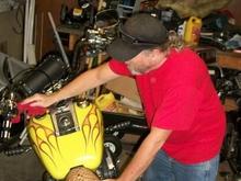 Mike Cleaning his Hog.