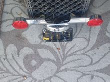 Rear turn signal bar. wires to license plate light are cut. $20