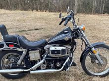 Looks to have the original 1980 2 piece header pipes with integrated mufflers & tripple tree mounted turn signals !