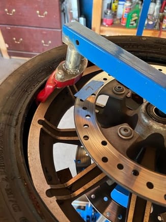 Using the "duckbill" attachment for the first time.  It needed some tweaking of angles, which I did later.  Hopefully its now correct for the rear tire.  The duckbill attachment is for removing and installing the tire.  Once you have the angles correct, it works pretty smooth.
