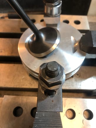 Valve face touching floor of pocket to check angle and y position 