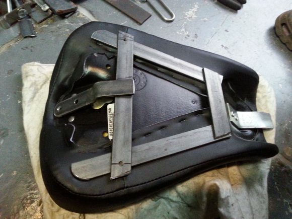 The basic frame supporting the original seat.